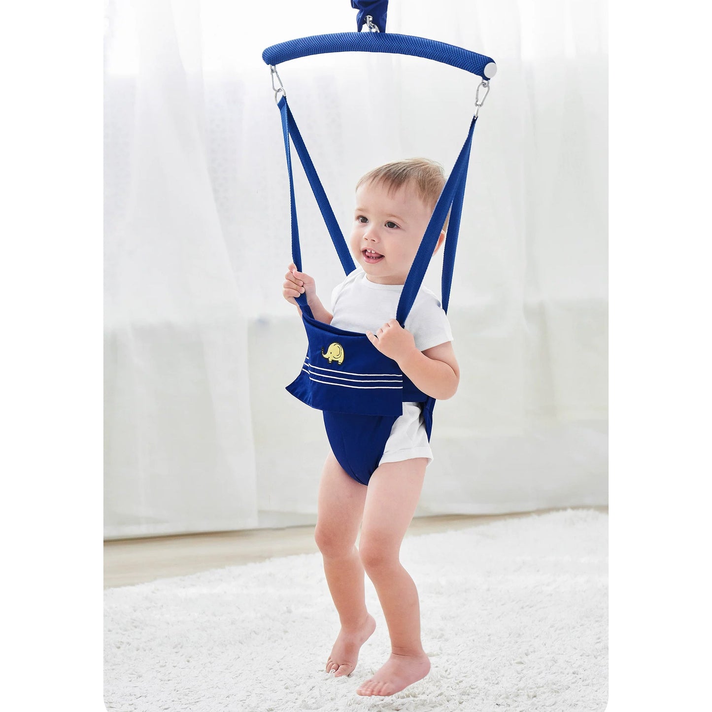 Suspended baby jumper with fabric-covered spring